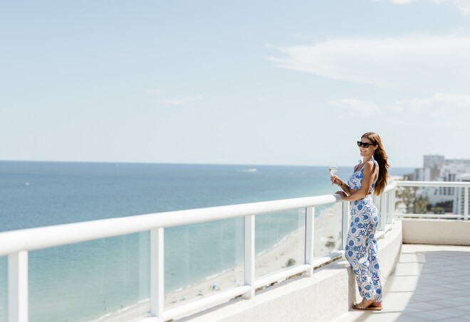 A woman looking out at the ocean in South Florida